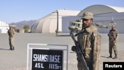 Soldiers guard the Shamsi airfield in Baluchistan Province in a Pakistani handout image from December, when U.S. personnel reportedly were evacuating a remote airfield used for staging drone strikes.
