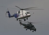 An Mi-35 helicopter (background) with a Mi-38 model (ITAR-TASS)