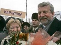 Opposition candidate Milinkevich, shown here with his wife last week, says his supporters just want a free and fair election (Bymedia.net)