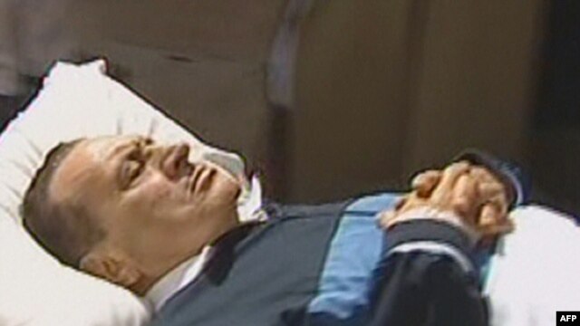 Hosni Mubarak is wheeled into a courtroom in Cairo in September 2011.