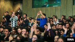 Audience members chanting at a Student Day event at Tehran University on December 7.