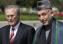President Karzai (right) with Defense Secretary Rumsfeld in Washington in September 2006 (epa)