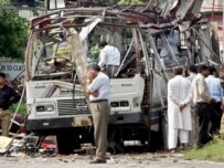 The twin attacks hit a bus and a market (AFP)