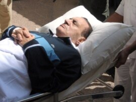 Former Egyptian President Hosni Mubarak is taken to the courtroom for another session of his trial in Cairo in September.