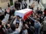 Iran -- People take part in the funeral of Sanee Zhaleh, a student who was shot dead during a recent opposition rally, Tehran, 16Feb2011