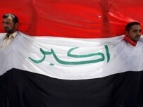 Demonstrators in Al-Najaf on April 9 (AFP)