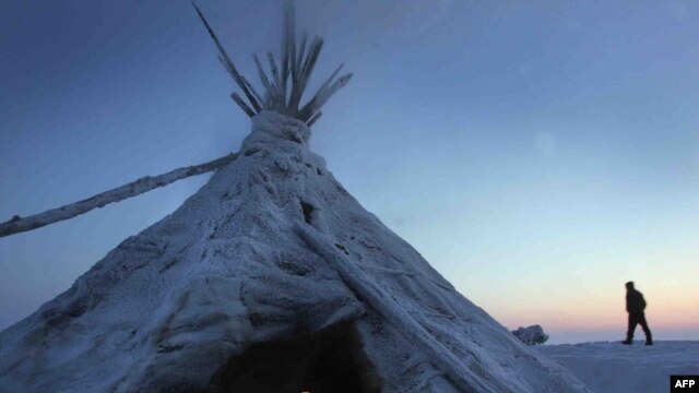 A Nenets reindeer herder on the frozen tundra some 200 kilometers northwest of Naryan-Mar.