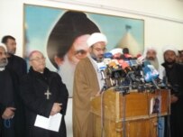 Abdul-Hadi al-Darraji, speaking to journalists in Baghdad in February 2006 (RFE/RL)