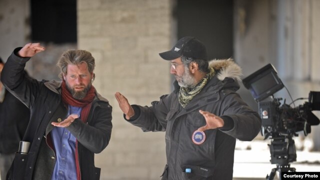 Director Sam French (left) says he had to overcome many challenges to complete the filming of the "Buzkashi Boys" in Kabul.
