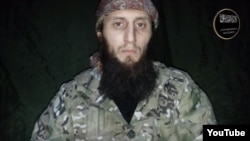 A screengrab of Caucasus Islamist insurgent Mukhammad Abu Dudjana Gimrinsky who recently made a video appeal calling on "sincere believers" to join the jihad against "unbelievers."