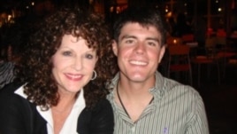 Becky Whetstone (left) with her son, U.S. Marine Lance Corporal Benjamin Whetstone Schmidt, who died in October 2011