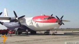 Armenia - An Antonov-12 cargo plane carrying humanitarian aid for Syrians prepares to take off from Yerevan airport, 15Oct2012.