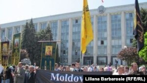 Moldovans protest against the official registration of Muslim group in Chisinau on May 18.