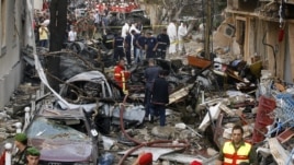 Lebanese security forces and rescue workers gather at the site of an explosion in Beirut on October 19.