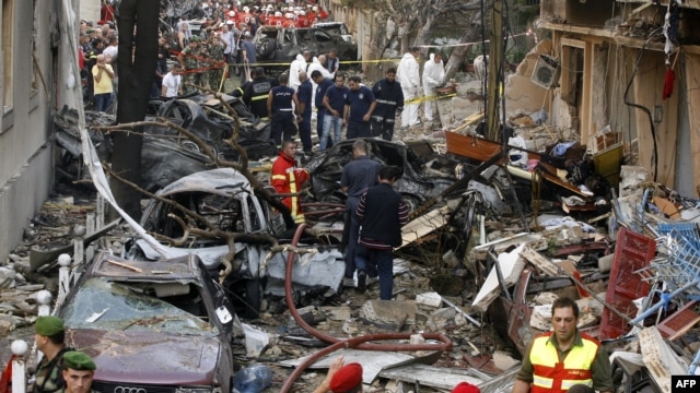 Lebanese security forces and rescue workers gather at the site of an explosion in Beirut on October 19.