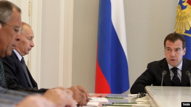 Foreign Minister Sergei Lavrov with Vladimir Putin and Dmitry Medvedev (left to right, in file photo)