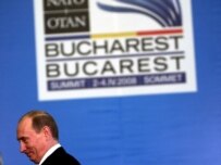 Russian President Vladimir Putin arrives at the NATO summit in Bucharest today (epa)