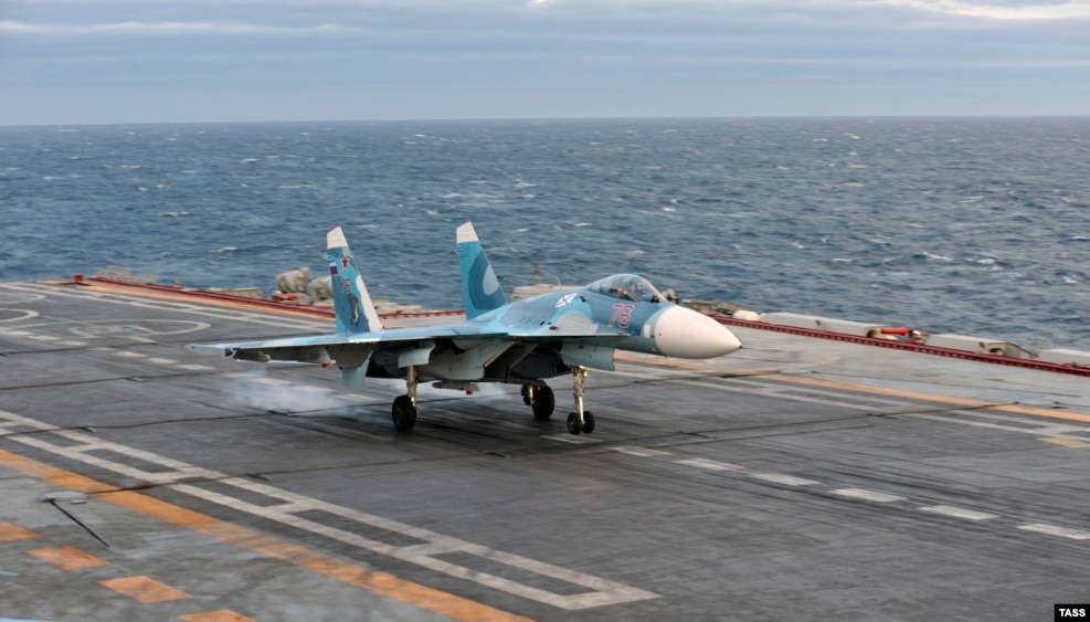 A Sukhoi fighter landing on the deck of the Admiral Kuznetsov. In 2005, a fighter jet plummeted off the end of the carrier after an arresting cable snapped on landing. Both pilots escaped, but the plane plunged into 1-kilometer-deep water.