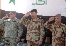 Iraq -- Major General Mubdir Hatim al-Dulaymi (C), commanding general for the 6th Iraqi Army Division, saluting during a camp handing over ceremony in Baghdad last Janaury 2006