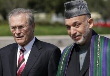 U.S. -- US Secretary of Defense Donald Rumsfeld (L) and Afghan President Hamid Karzai in Washington, DC Monday, 25Sep2006