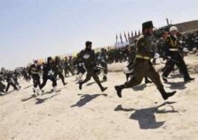 Afghanistan - Afghan soldiers take up positions after shots fired at Kabul military parade, 27apr2008