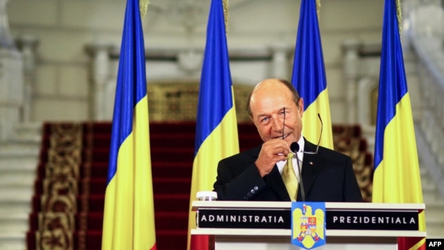 Romanian President Traian Basescu delivers a speech at the Cotroceni Palace in Bucharest on July 3.