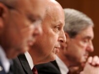 John Negroponte (center) testifying in the Senate on January 11 (epa)