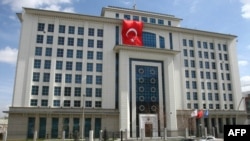 The attackers fired a rocket at the headquarters of Prime Minister Recep Tayyip Erdogan's party in Ankara.