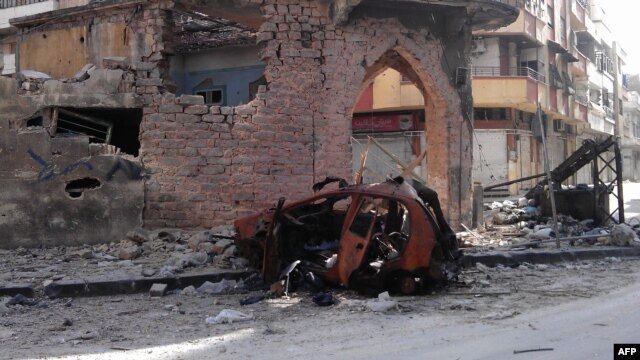 Many districts in the central Syrian city of Homs have been destroyed as a result of the conflict in the past year. 