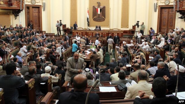 The defiant parliament meets in Cairo on July 10.