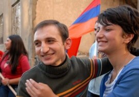 Detained Armenian opposition activist Tigran Arakelian (left)