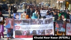 Family members of missing Baluchs, mostly political activists, rally in protest on the eve of international Human Rights Day in Quetta, Balochistan, on December 10, 2011.