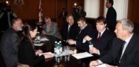 Minister Giorgi Khaindrava (right) meets with ambassadors from the United States, Great Britain, France, Germany, and the OSCE in Tbilisi on 14 February (InterPressNews)