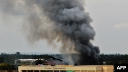 Smoke rises from the Westgate mall in Nairobi as fighting continued on September 23.