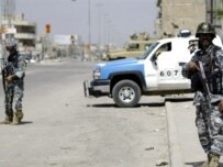 Iraqi security forces in Al-Basrah on March 25 (AFP)