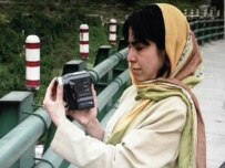 Mehrnoushe Solouki filming in Tehran in 2005, which appears in her film \