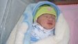 Newborn Sarkozy in his Gyumri hospital bed on January 25