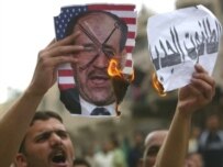 Protesters in Baghdad on March 27 (AFP)
