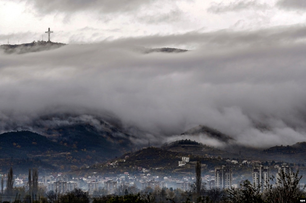 Clouds and fog hang over the Macedonian capital, Skopje, on November 8. (epa/Georgi Licovski)