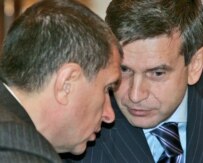 The siloviki are thought to be centered around Igor Sechin (left) (TASS) 