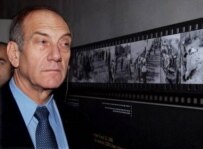 Ehud Olmert touring the Holocaust History Museum in Jerusalem in January (epa)
