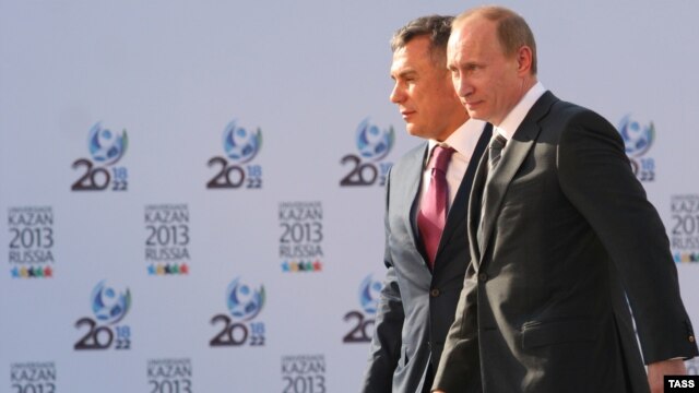Tatarstan republican President Rustam Minnikhanov (left) at an appearance with Vladimir Putin.