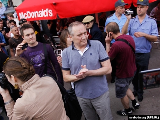 Uladzimer Nyaklyaeu takes part in a 'flash mob' protest in Minsk on June 15.