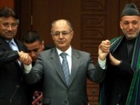 Musharraf (left) and Karzai (right) with Turkish President  Ahmet Necdet Sezer today (epa)