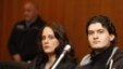 Arid Uka (right) arrives with his lawyer for sentencing during his trial at the higher regional court in Frankfurt.
