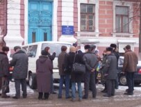 Belarusian police inspect a minibus carrying members of a Swedish political party earlier this month (RFE/RL)