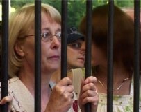 Jauhenija Astrejka, mother of Mikola Astrejka, outside the court building on August 4 (RFE/RL)