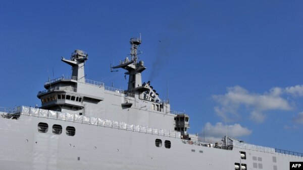 A Mistral class warship ordered by Russia in a French shipyard.