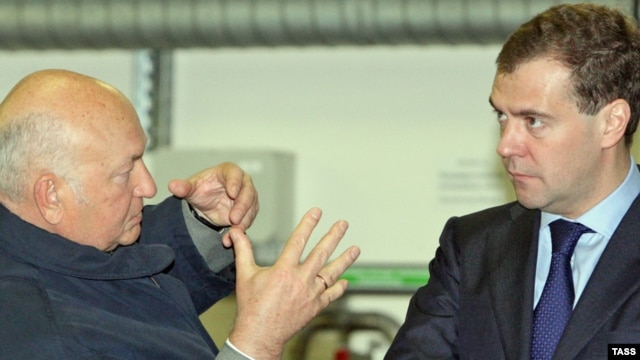 President Dmitry Medvedev (right) and Moscow Mayor Yury Luzhkov in May