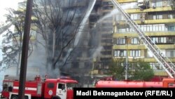 The blaze quickly engulfed a nearby building, completely destroying some 20 apartments.